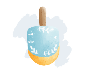 A blue and yellow dreidel. Playing dreidel is one of the best holiday activities for seniors!